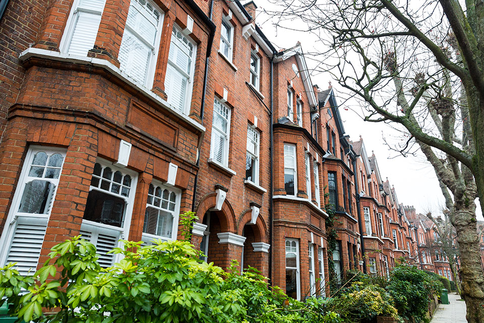 row of old brick town homes